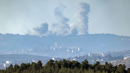 Plumes of smoke spread after the Israeli bombardment of southern Lebanon from northern Israel, September 29, 2024. (MENAHEM KAHANA / AFP)