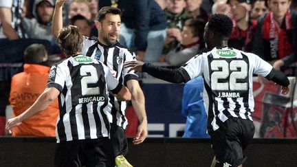 Thomas Mangani (Angers SCO) et ses coéquipiers (JEAN-FRANCOIS MONIER / AFP)