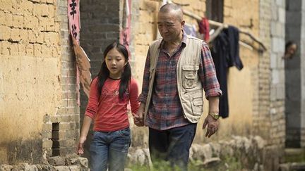 Baotian Li et Yan Xin Yi dans "Le Promeneur d'ooiseau" de Philippe Muyl
 (Envisions Films, Stellar Mega Films Ltd &amp; Pan Eurasia Films - tous droits réservés)