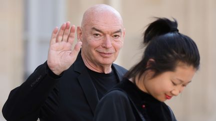 Jean Nouvel et son épouse, à L'Elysée lors de la remise à l'architecte du Prix Pritzker de l'architecture, le 24 mai 2019. (LUDOVIC MARIN / AFP)