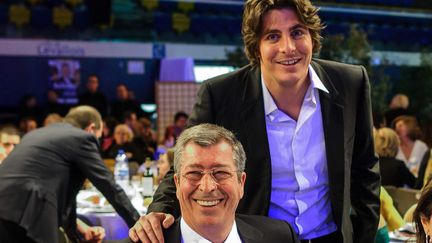 Patrick Balkany et son fils Alexandre Balkany, à Levallois-Perret (Hauts-de-Seine), le 6 mars 2014. (MAXPPP)