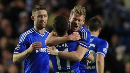 Entré à place d'Hazard à la 18e, Andre Schurrle a marqué le premier but des Blues.  (ADRIAN DENNIS / AFP)