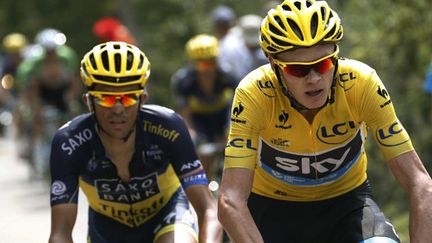 Chris Froome et Alberto Contador (Tour de France 2013) ont rendez-vous sur les routes du Dauphiné Libéré (JOEL SAGET / AFP)