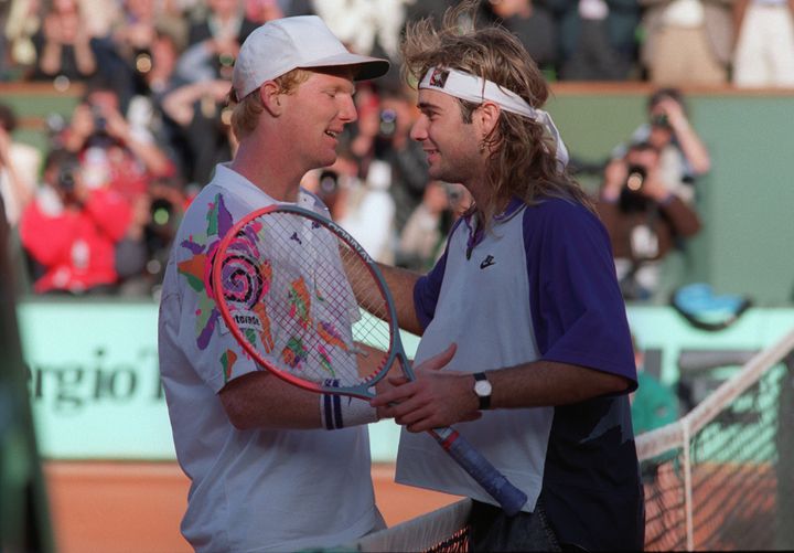 Jim Courier face à Andre Agassi (JEAN-LOUP GAUTREAU / AFP)