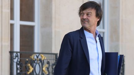 Le ministre de l'Écologie&nbsp;Nicolas Hulot quitte l'Elysée, le 14 mars 2018 à Paris. (LUDOVIC MARIN / AFP)