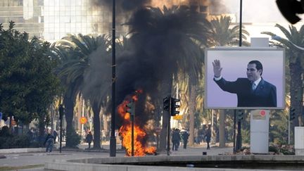 Tunis, le 14 janvier 2011, jour de la chute du régime de Ben Ali... (AFP/FETHI BELAID)