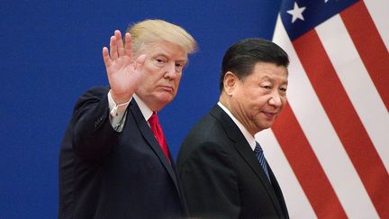 Donald Trump et le président chinois Xi Jinping, le 9 novembre 2017. (NICOLAS ASFOURI / AFP)