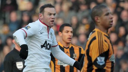 Wayne Rooney juste après avoir marqué son 150e but en Premier League au KC Stadium à Hull le 26/12/2013 (LINDSEY PARNABY / AFP)