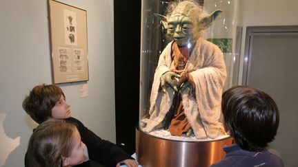 Maître Yoda fait partie des personnages préférés des enfants (JACK GUEZ / AFP)