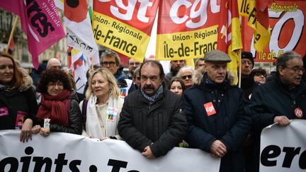 Le secrétaire général de la CGT Philippe Martinez (C) lors d'une manifestation à Paris, le 20 février 2020, contre la réforme des retraites. (MARTIN BUREAU / AFP)