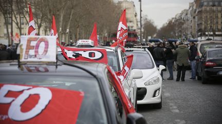 Manifestation des taxis &agrave; l'appel de leurs syndicats, contre la concurrence des VTC,&nbsp;le 10 f&eacute;vrier 2014, &agrave; Paris. (  MAXPPP)