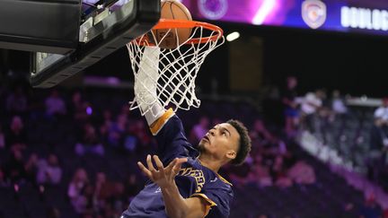 Le nouveau phénomène du basket français Victor Wembanyama à l'échauffement avant le match entre son équipe des Metropolitans 92 et le G-League Ignite, le 4 octobre 2022 à Henderson, dans le Nevada (JOHN LOCHER / AP)