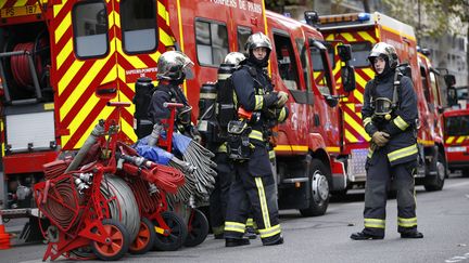 Des pompiers à Paris le 22 octobre 2014. (KENZO TRIBOUILLARD / AFP)