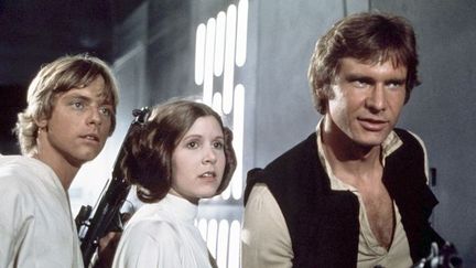 Mark Hamill, Carrie Fischer et Harrison Ford dans le premier volet de "Star Wars", de George Lucas, en 1977...
 (Screene Prod / Photononstop / AFP)