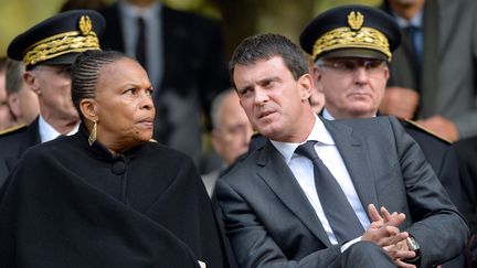 La ministre de la Justice, Christiane Taubira et le ministre de l'Int&eacute;rieur, Manuel Valls, &agrave; Paris, le 13 septembre 2013. (MIGUEL MEDINA / AFP)