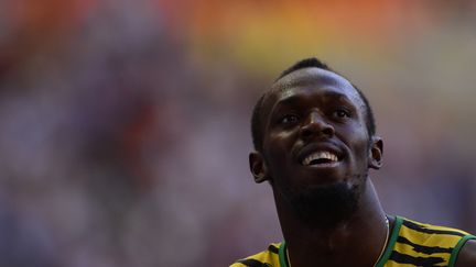 Usain Bolt apr&egrave;s la demie-finale du 200m masculin, le 16 ao&ucirc;t 2013 &agrave; Moscou (Russie). (OLIVIER MORIN / AFP)