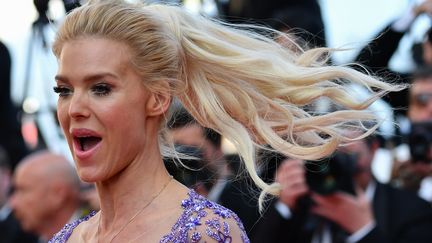 Pour le top model et animatrice Victoria Silvstedt, toujours vivre le Festival comme si c'était la première fois. 
 (Alberto PIZZOLI / AFP)