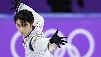 Le patineur Yuzuru Hanyu lors du programme libre des Jeux olympiques de Pyeongchang (Corée du Sud), le 17 février 2018. (YOMIURI / AFP)