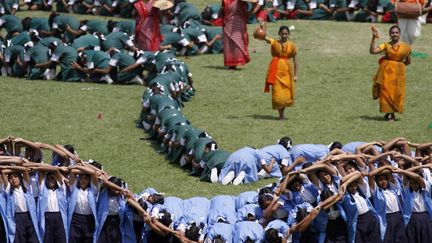 Des &eacute;tudiants participent &agrave; une c&eacute;r&eacute;monie comm&eacute;morant l'ind&eacute;pendance du Bangladesh &agrave; Dhaka, le 26 mars 2012. (ANDREW BIRAJ / REUTERS)