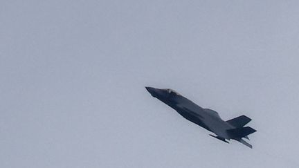 An Israeli plane flies over southern Lebanon on February 13, 2024. (JALAA MAREY / AFP)