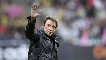 Johnny Hallyday peu avant le match de rugby Stade fran&ccedil;ais - Racing metro du 3 d&eacute;cembre 2011 au Stade de France &agrave; Paris. (THOMAS SAMSON / AFP)