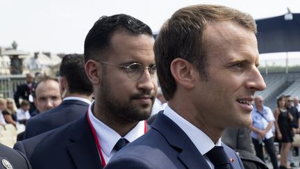 Alexandre Benalla et Emmanuel Macron, le 14 juillet 2018.&nbsp; (PHILIPPE WOJAZER / POOL)