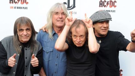 AC/DC : Malcolm Young, Cliff Williams, Angus Young et Brian Johnson, à Londres en 2011.
 (RHA/ZOB/WENN.COM/SIPA)