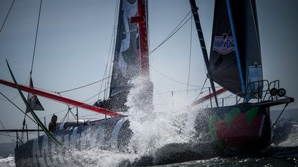 Yannick Bestaven à bord de Maître Coq le 9 avril 2024 au Portugal, est le tenant du titre du Vendée Globe. (LOIC VENANCE / AFP)