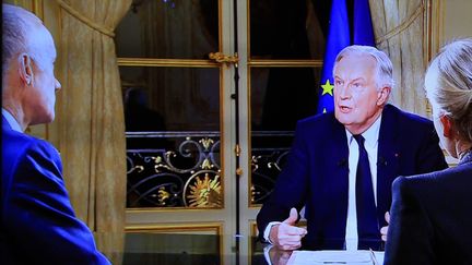 Michel Barnier était interrogé mardi 3 décembre aux 20h de France 2 et TF1. (PIERRE TEYSSOT / MAXPPP)