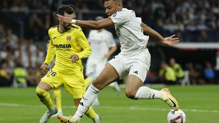 Non selectionné en équipe de France pour les deux prochains match à cause d'une blessure à la cuisse, Kylian Mbappé a joué 70 minutes pour le Real Madrid le 5 octobre 2024. (OSCAR DEL POZO / AFP)