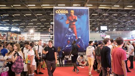 Grande affiche de la série de mangas "Cobra, le pirate de l'espace" de Buichi Terasawa lors de l'exposition Japan Expo 2018, le 5 juillet 2018 à Villepinte, près de Paris. (THOMAS SAMSON / AFP)