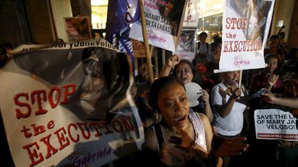 &nbsp; (Réaction après le report de l'exécution de la Philippine Mary Jane Veloso © REUTERS/Erik De Castro)