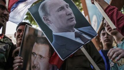 Manifestation de soutien à Vladimir Poutine à Lattaquié (Syrie) en 2013. (ANDREY STENIN / RIA NOVOSTI/AFP)