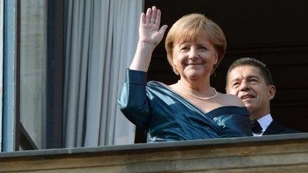 La chancelière Angela Merkel et son mari Joachim Sauer à l'ouverture du Festival Wagner de Bayreuth, en Allemagne, le 25 juillet 2012. ( AFP PHOTO / CHRISTOF STACHE)