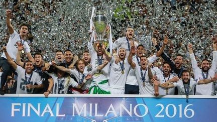 Les stars du Real Madrid célébrant leur victoire face à l'Atletico Madrid, le 28 mai 2016 à Milan (Italie).&nbsp; (ANTON DENISOV / SPUTNIK / AFP)