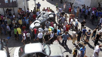 &nbsp; (Les trois occupants d'une voiture auraient notamment été tués ce lundi dans la bande de Gaza © REUTERS/Ahmed Zakot)