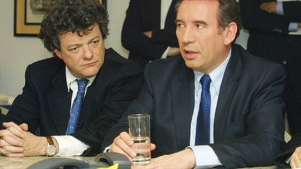 Jean-Louis Borloo et François Bayrou à Nice, en 2002. (JACQUES MUNCH / AFP)