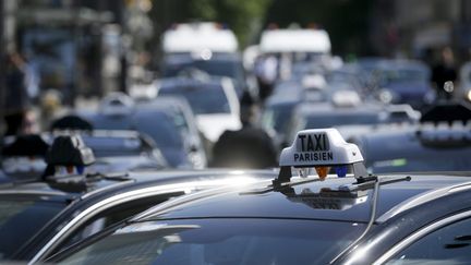  (Les taxis se sont mobilisés à plusieurs reprises contre Uber et les VTC © MAXPPP)