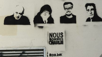 Pochoir représentant les dessinateurs sur le mur des bureaux du journal Charlie Hebdo à Paris, rue Nicolas Appert, en avril 2015
 (WINFRIED ROTHERMEL / PICTURE ALLIANCE / PICTURE-ALLIANCE/AFP)