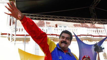 Nicolas Maduro a été élu de justesse en avril 2014 après la mort d'Hugo Chavez. Depuis son arrivée à la présidence, il suit la politique socialiste de son prédécesseur. (AFP PHOTO/PRESIDENCIA)