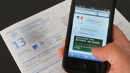 &nbsp; (3,7 millions de ménages seront concernés par la réduction d'impôts © Maxppp)