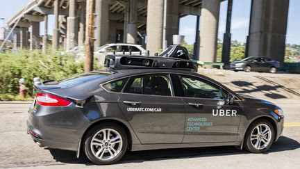 Une voiture Uber autonome en test à Pittsburgh, en Pennsylvanie, le 13 septembre 2016. (ANGELO MERENDINO / AFP)