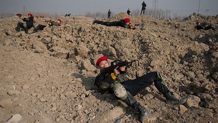 Lors de l’affaire du Soudan, un haut conseiller du ministère des Affaires étrangères à Pékin avait déclaré que des entreprises de sécurité chinoises devraient être «autorisées à agir à l'étranger».
 
 
 (AFP PHOTO / Ed Jone)