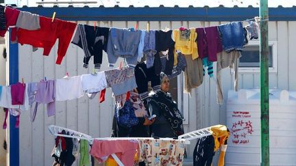 Des déplacés libyens de la ville de Tawargha dans un camp à Tripoli. (AFP/ Mahmud Turkia)