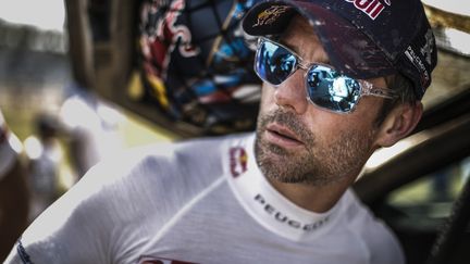 Une chaleur qui n'a visiblement pas l'air d'éprouver Sébastien Loeb, solide leader du Dakar avant la troisième étape. (FRANCOIS FLAMAND / DPPI MEDIA)