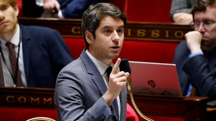 Le ministre chargé de l'Action et des Comptes publics, Gabriel Attal, le 17 février 2023 à l'Assemblée nationale. (LUDOVIC MARIN / AFP)