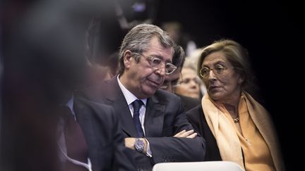 Patrick et isabelle Balkany participent à une réunion publique lors de l'entre-deux tours des élections régionales, le 9 décembre 2015. (MAXPPP)