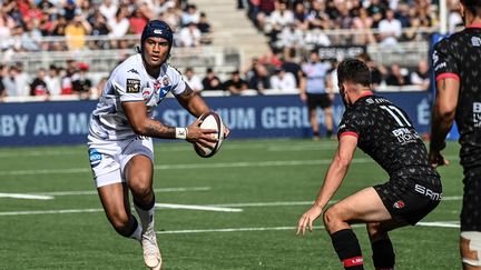 UJ Seuteni et les Bordelais l'ont emporté à Lyon (15-20). (OLIVIER CHASSIGNOLE / AFP)