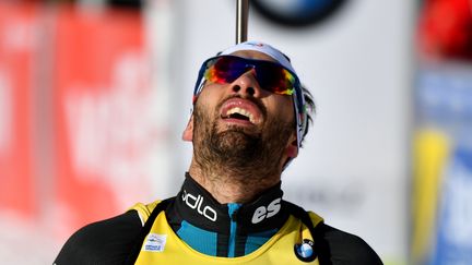 Le&nbsp;champion français de biathlon Martin Fourcade, après sa défaite face à Johannes Boe, lors&nbsp;du sprint d'Anterselva (Italie),&nbsp;le 19 janvier 2018.&nbsp; (ALBERTO PIZZOLI / AFP)