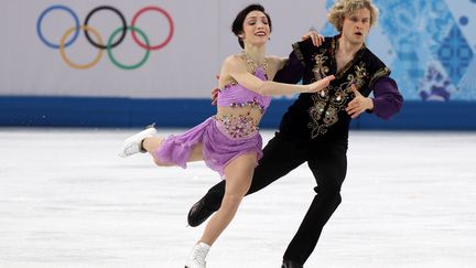 Charlie White et Meryl Davis lors de leur sacre olympique à Sotchi en 2014 (POOL / KMSP)